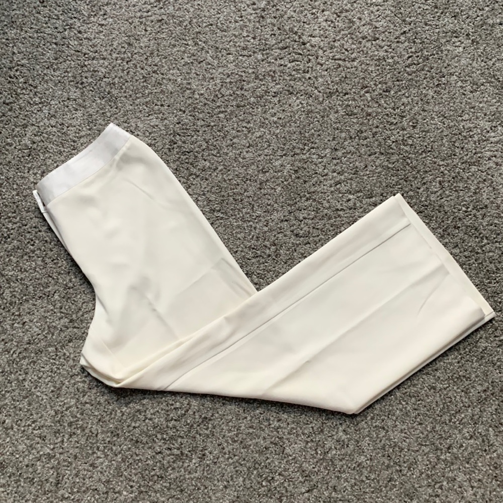 Cream Chico’s dress pants (size 1.5). Fits beautifully, soft, great to dress up